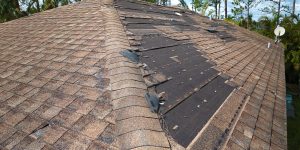 damaged roof call Muth Roofing